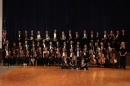 The Florida Intergenerational Orchestra of America pictured with founder and composer Lorraine Marks-Field.