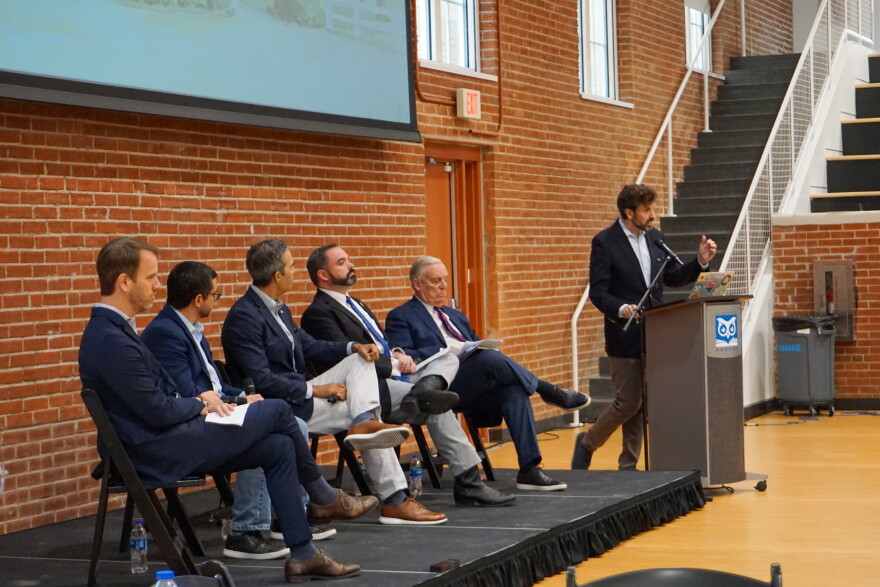 Matt Ewalt, senior director of events at the Texas Tribune, introduces each member of the panel.
