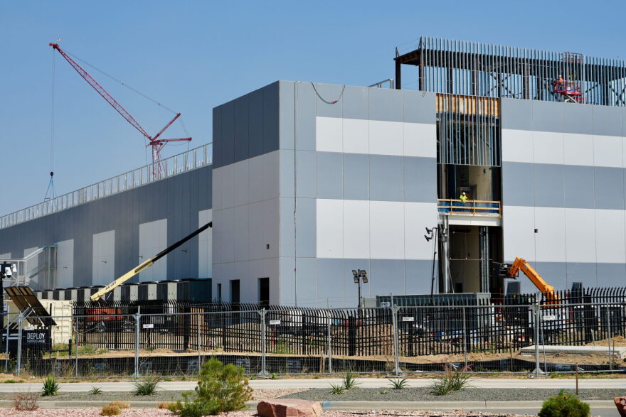 A large warehouse looking building under construction.