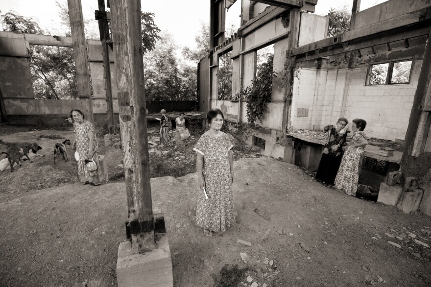 "We will not forget what happened until the day we die. It has been engraved in our hearts," said Francia Aga Buco (center). On Nov. 23, 1944, Buco was one of the girls and women raped in the village of Mapaniqui. Buco, who became a seamstress, was not eligible for Japanese compensation for "comfort women" because she was not held over an extended period.