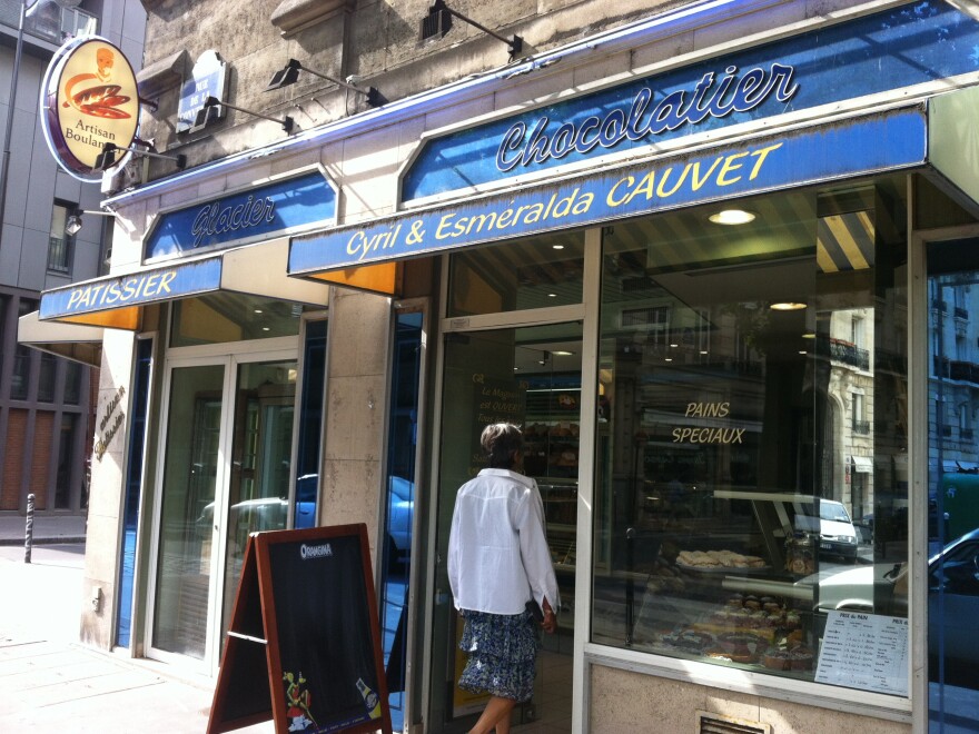 A woman walks into Boulangerie Cauvet in Paris, where they still make croissants from scratch.