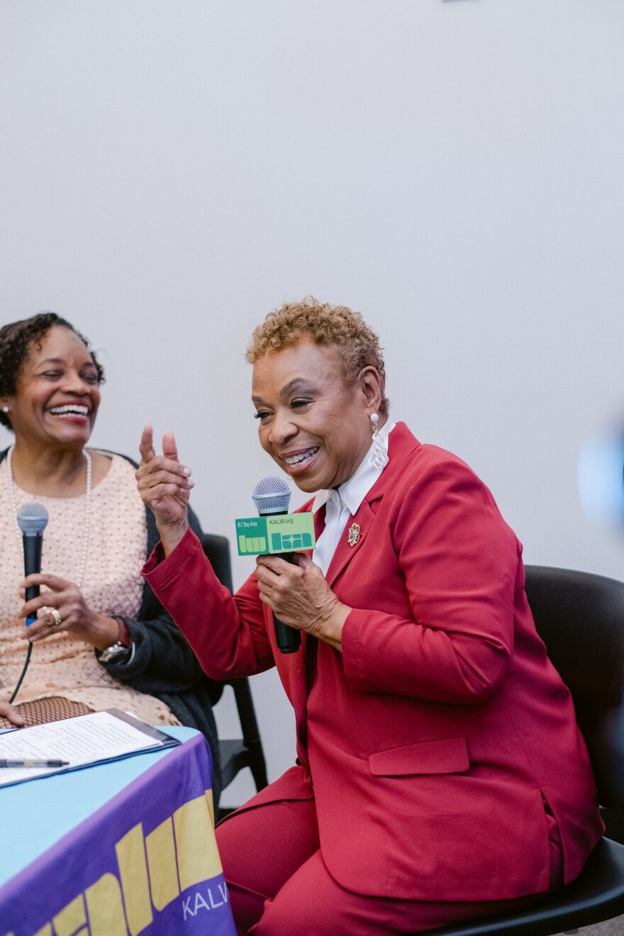 Susan Brown and Representative Barbara Lee share a moment at the Beyond the Fog Radio Live recording at KALW's studio events space.