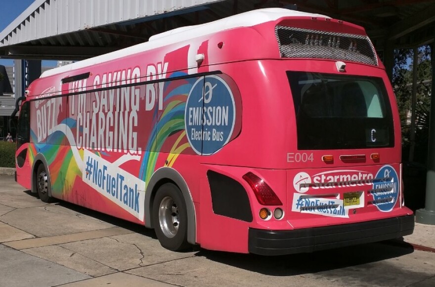 A pink StarMetro bus