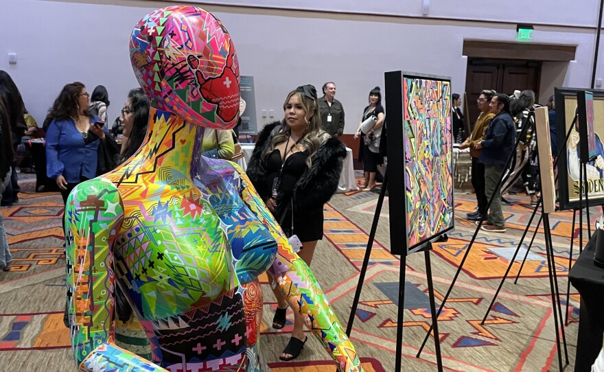 Artwork displayed during SWAIA's Native Fashion Week art market.