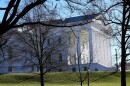 FILE - The state and U.S. flags fly over the Virginia State Capitol as the 2024 session of the Virginia General Assembly gets underway, Jan. 10, 2024, in Richmond, Va.