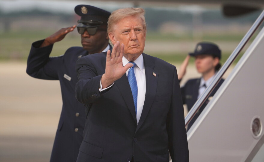 President Donald Trump waves after arriving off Air Force One, Friday, Aug. 28, 2026, at Joint Base Andrews, Md. (AP Photo/Mark Schiefelbein)