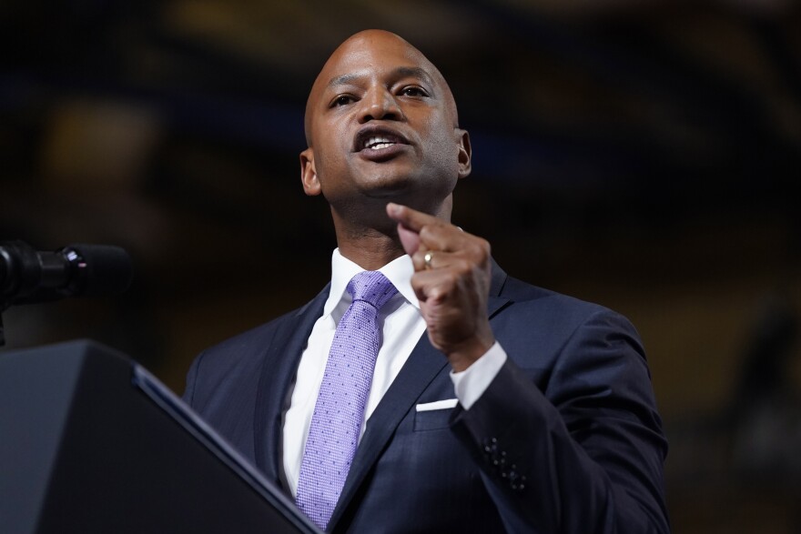 FILE - Maryland Democratic gubernatorial candidate Wes Moore speaks ahead of President Joe Biden during a rally hosted by the Democratic National Committee at Richard Montgomery High School, Thursday, Aug. 25, 2022, in Rockville, Md. Moore holds a big lead in fundraising over Republican Dan Cox so far in Maryland’s governor’s race. (AP Photo/Evan Vucci, File)