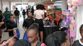 Students jam the mezzanine level of FAMU's Lawson Center to check out various vendors and information booths.