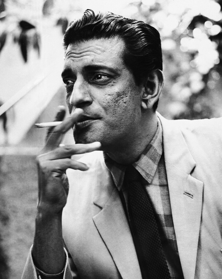 Satyajit Ray, seen here in 1967, was a graphic designer in the 1940s and worked with French filmmaker Jean Renoir.
