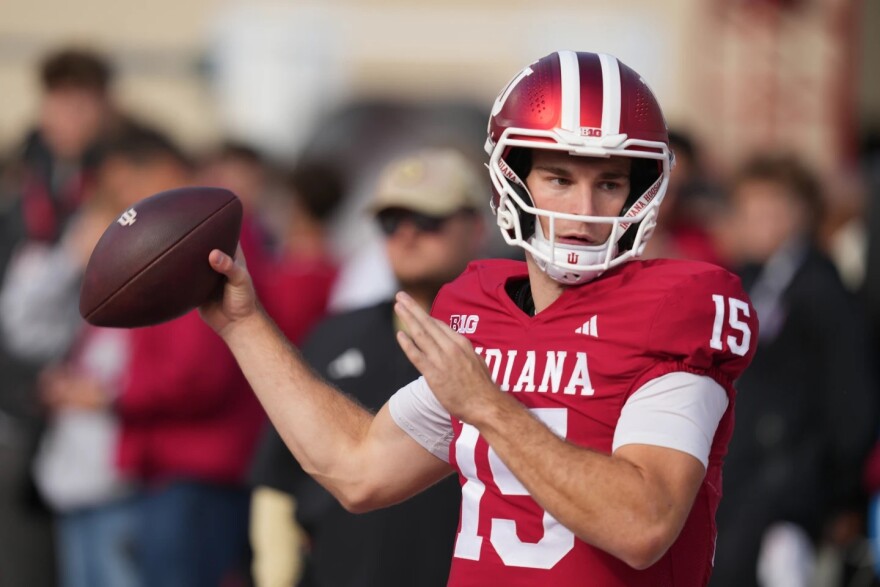 Indiana quarterback Fernando Mendoza throws before an NCAA college football game against Wisconsin, Saturday, Nov. 15, 2025, in Bloomington, Ind.