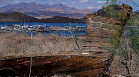 The remains of a boat sit out of the water at the Lake Mead National Recreation Area on Wednesday, Apr. 01, 2026, Boulder City, Nev. (AP Photo/Ty ONeil)
