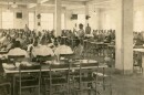 A group of boys sit in a dining hall at Dozier, circa 1940.