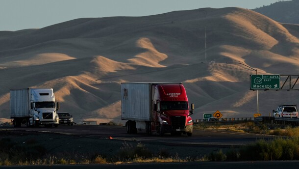 FILE - Freight trucks travel northbound on Interstate 5 Highway, Wednesday, Sept. 3, 2025, in Tracy, Calif. 