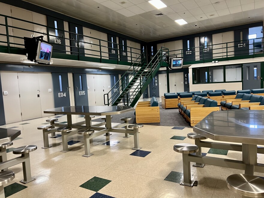 The lone women's unit at the Barnstable County Correctional Facility consists of two floors organized around a common room.