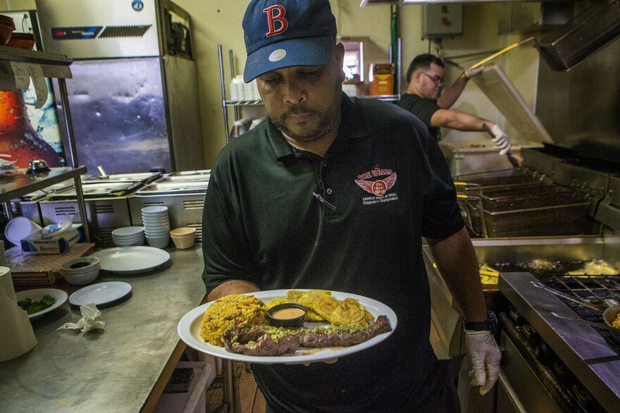 Cora's favorite dish at The Wings in his hometown of Caguas: skirt steak with rice and beans. (Jesse Costa/WBUR)