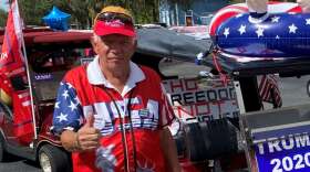 Stan Weis, shown here during a Villagers for Trump golf cart parade in August, led a car caravan on Wednesday. Photo: Joe Byrnes