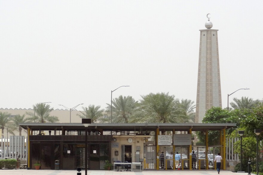 A mosque is seen behind the entrance gate to the headquarters of Saudi Aramco in Dhahran in 2016.