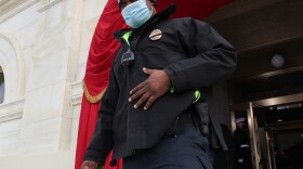 Capitol Police Officer Eugene Goodman, hailed by many for his heroism during the Jan. 6 attack on the U.S. Capitol, participates in a the dress rehearsal for Inauguration Day. CREDIT: Pool/Getty Images