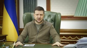 In this image from video provided by the Ukrainian Presidential Press Office and posted on Facebook early Saturday, March 12, 2022, Ukrainian President Volodymyr Zelenskyy speaks in Kyiv, Ukraine. (Ukrainian Presidential Press Office via AP)