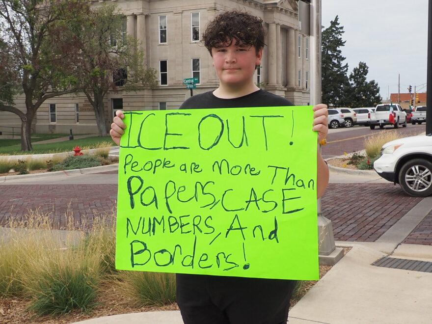 Priest Mercado, 15, attends a Dodge City march on Sept. 25, 2026, to protest the presence of U.S. Immigration and Customs Enforcement agents detaining immigrants in his community. He said that he doesn't believe families should be torn apart. 