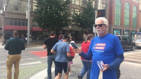 Volunteers handed out 1,000 pocket-sized editions of the U.S. Constitution to passersby in downtown Indianapolis Tuesday.