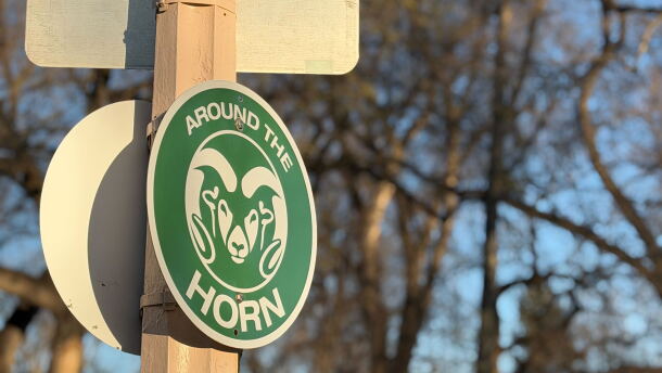 The CSU Rams logo on a street sign.