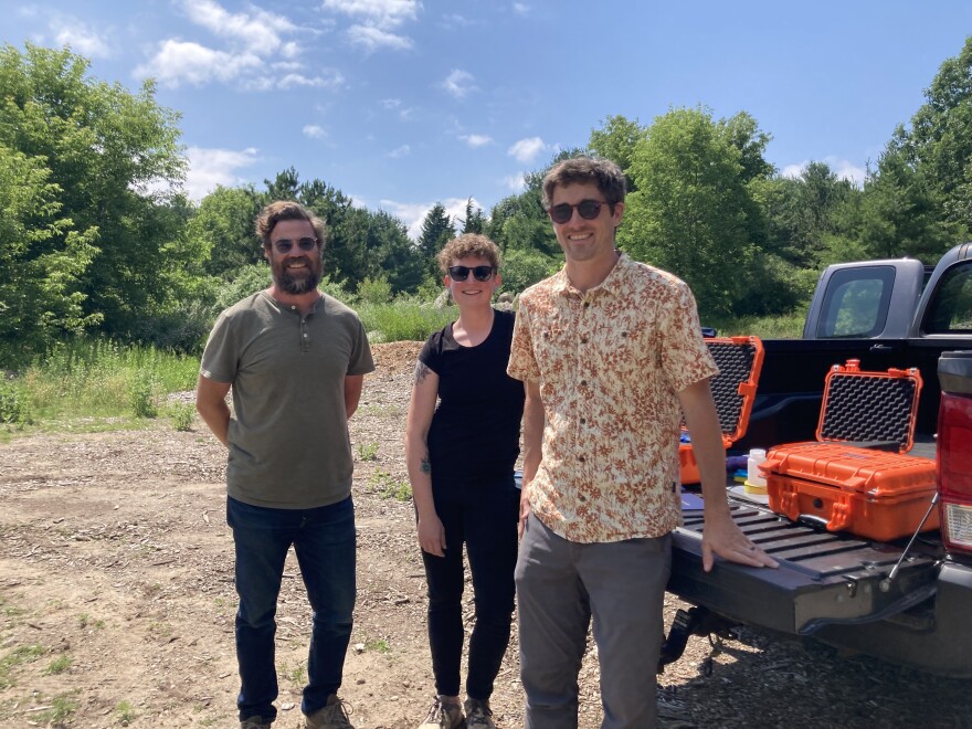 From L-R: John Woodruff, Stephanie Baklarz and Vernon LaLone. The three of them work for Wave Lumina, a startup founded by LaLone (R), which is developing rapid PFAS-testing technology. Right now, lab results for PFAS in water take several weeks. Wave Lumina tests samples onsite in minutes. (Photo: Ellie Katz/IPR News)