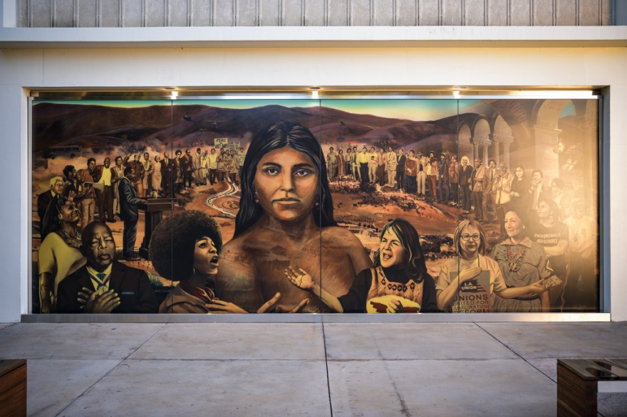 “La Memoria de la Tierra,” a mural by Judith Baca on the north side of Ackerman Union at UCLA in Los Angeles, on Nov. 9, 2022. The mural spans about 80 feet and consists of three 26-foot-long glass panels. The middle panel depicts historical women, including Toypurina, a Tongva woman who opposed Spanish colonization in California in the late 1700s.