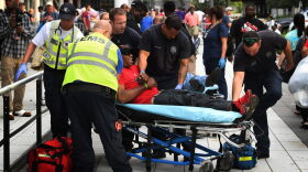 An evacuee is taken to hospital after feeling unwell at the Convention Center which is serving as an evacuation shelter after Hurricane Harvey caused heavy flooding in Houston, Texas on Aug. 30, 2017. (Mark Ralston/AFP/Getty Images)