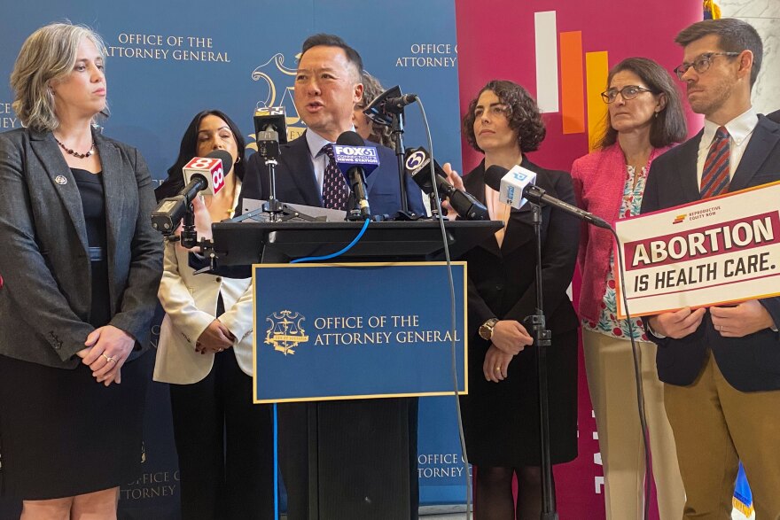 Connecticut Attorney General William Tong, in partnership with the Reproductive Equity Now Foundation, announces the launch of a new abortion legal hotline in anticipation of more demand for legal clarifications following the President Donald Trump's comeback. Tong is flanked at his office in Hartford by state lawmakers and pro-choice advocates.