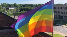 Independence Mayor Eileen Weir hangs a rainbow flag outside of her office during Pride Month since proposals to hang pride flags on city buildings has gone unapproved.