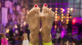 The feet of a yoga participant are pictured during the early morning Daybreaker yoga/dance party event at the Institute of Contemporary Arts in Boston on Oct. 19, 2017. Its hard to get out of bed while it is still pitch dark, but a surprising number of Bostonians do just that. They get their workouts done before the rising sun kisses the top of the John Hancock Tower. (Photo by Stan Grossfeld/The Boston Globe via Getty Images)