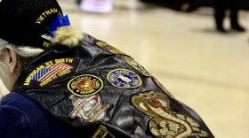 A veteran's vest at a Veterans Day ceremony at Joint Base Elmendorf-Richardson on Nov. 11, 2019. (Photo by Joey Mendolia/Alaska Public Media)