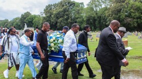 Pallbearers carry Lloyd Gilmore to his grave in Sikeston, Missouri. Gilmore died in police custody after an altercation with Sikeston police officers on June 10. (Cara Anthony/KFF Health News)