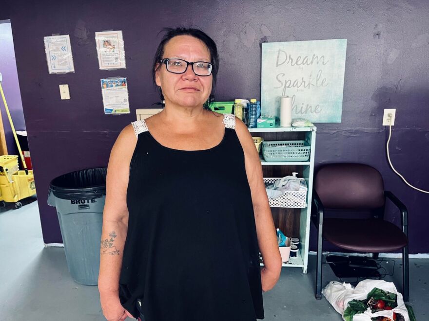 Former client of Sioux City's Warming Shelter, Tammy Bursell, seeks air conditioning and laundry service during a heatwave in Sioux City.