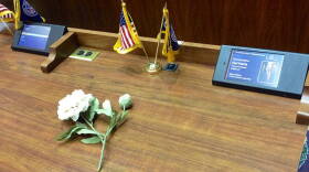 A flower sits on Rep. Ed Harris' desk in the Indiana House of Representatives.