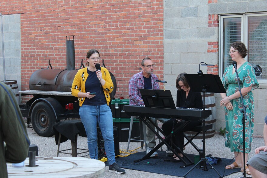 Classical Revolution ICT head Alex Johnson introduces an ensemble at Hutchinson's Sandhills Brewing.