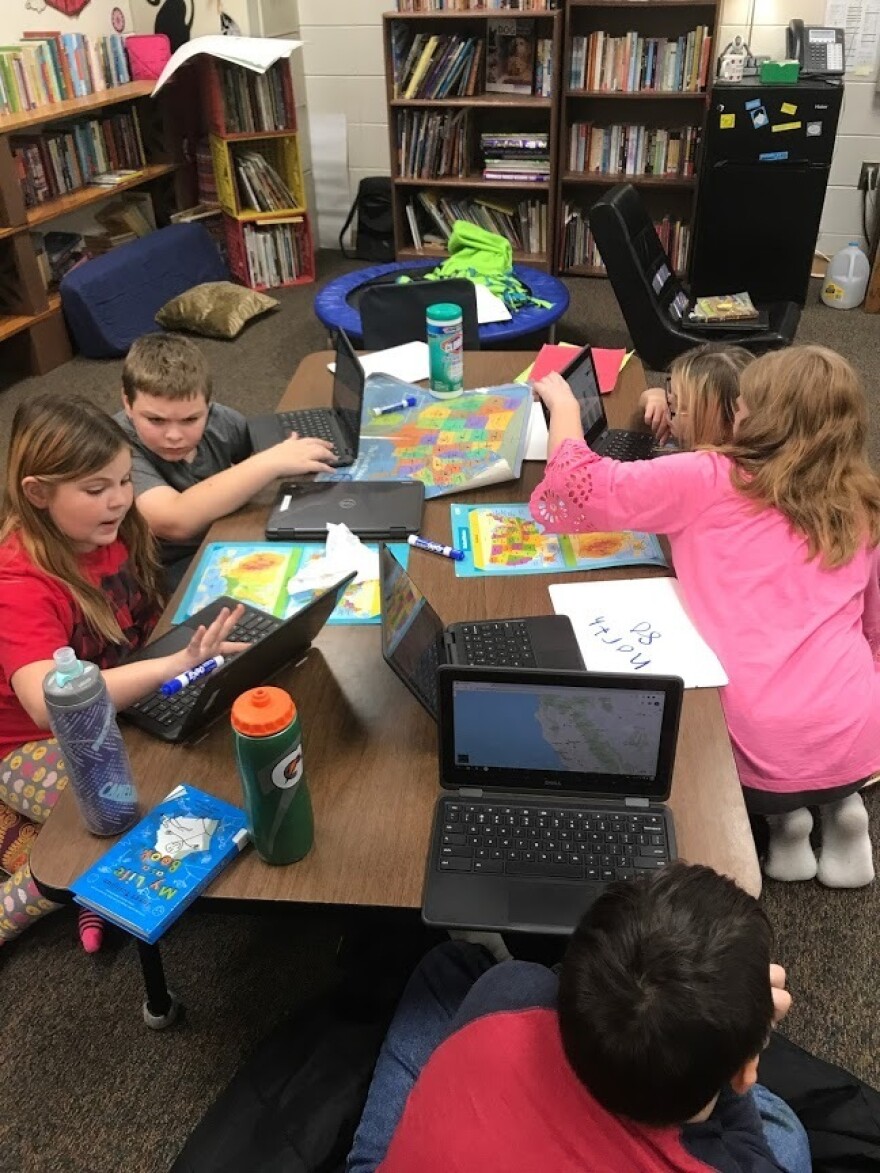 Fifth grade students at West Harrison Elementary School in Mondamin, Iowa play a game of Mystery Skype.