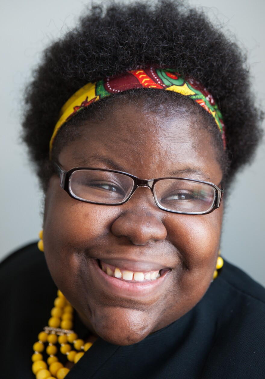 Ornella Mouketou, 25, has a job at a CVS pharmacy and is working toward becoming a pharmacy technician.