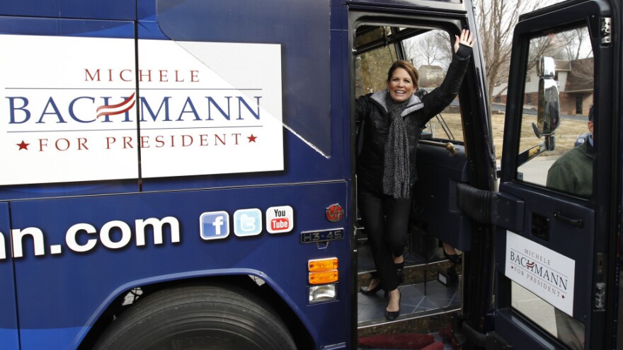Rep. Michele Bachmann waves to supporters Friday in Sioux City before starting a 99-county bus tour of Iowa.
