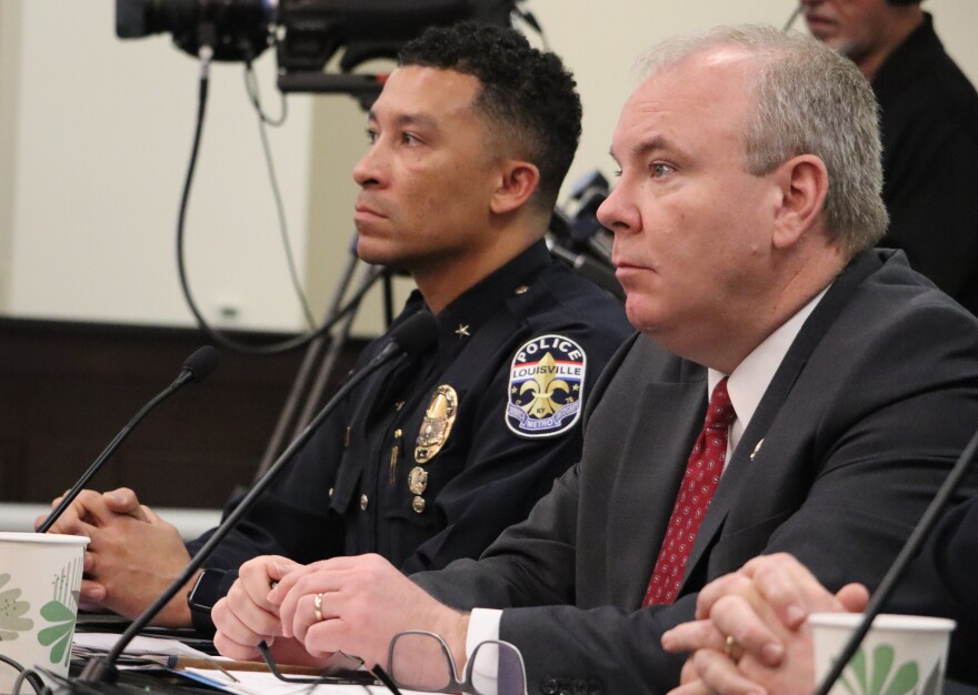 Rep. Jason Nemes, a Republican from Middletown, listens as votes are cast on House Bill 299 in committee Tuesday alongside Louisville Metro Police Chief Paul Humphrey.