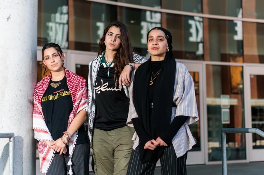 Sereen Haddad, center, poses for a portrait with Cristina Sayegh, left, and Zahra Jalajel on the steps of Virginia Commonwealth University's Cabell Library on Monday, June 30, 2025.