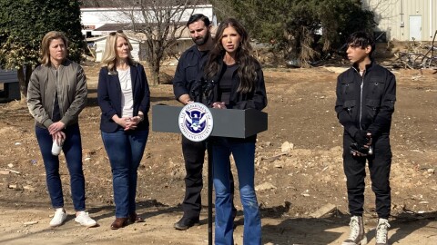 Homeland Security Secretary Kristi Noem, Asheville Mayor Esther Manheimer, Buncombe County Commission Chair Amanda Edwards, acting FEMA administrator Cameron Hamilton and Asheville City Council Member Bo Hess hold a press conference in Swannanoa on Saturday, Feb. 8, 2025.