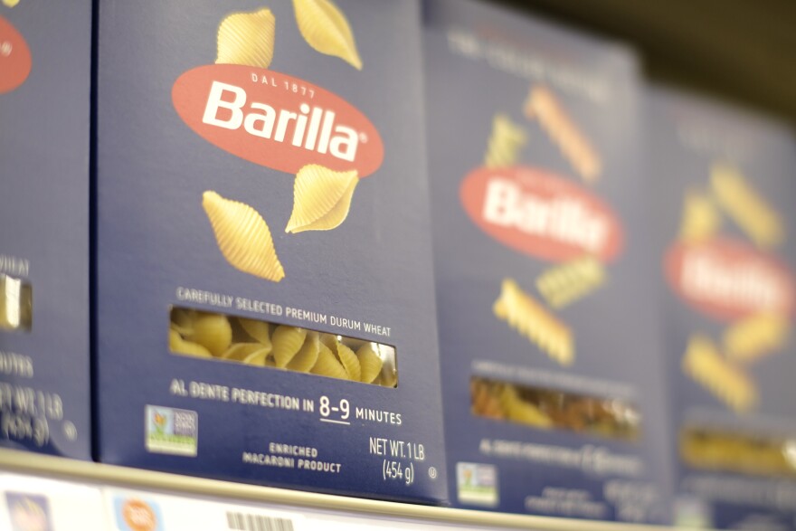 Pasta made from durum wheat line the shelves at a grocery store.