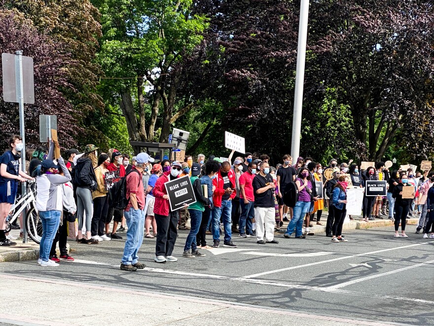 Protesters lined both sides of Pleasant Street, as well as the center of the street, in Amherst, Massachusetts, on May 31, 2020.