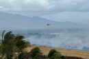 Helicopters dropped water on Saturday on the Olowalu brush fire burned more than 100 acres.