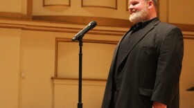 Tenor Scott Kennebeck auditions at Powell Hall for the chance to perform the national anthem at a St. Louis Blues game.