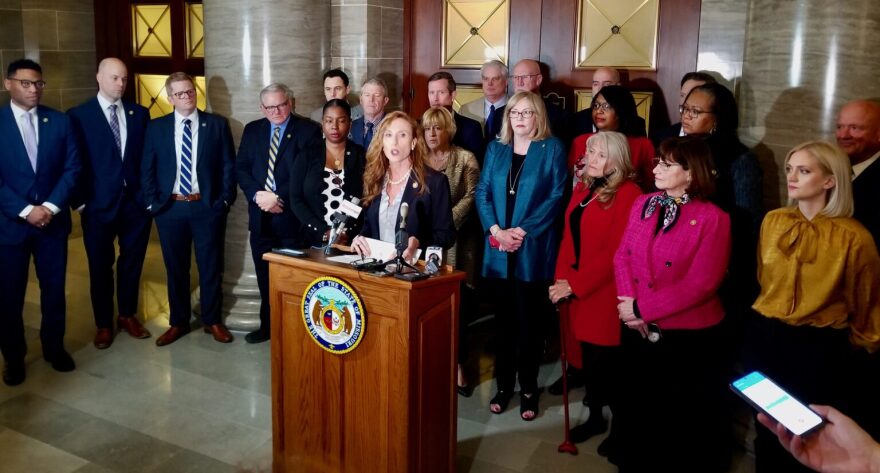 Sen. Holly Rehder, R-Sikeston, surrounded by Senate colleagues, speaks to the press during a news conference on March 9. 