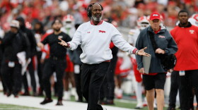 Maryland head coach Michael Locksley, center, reacts to a referee's call during the first half of an NCAA college football game against Ohio State, Saturday, Oct. 10, 2026, in Columbus, Ohio. (AP Photo/Jay LaPrete)