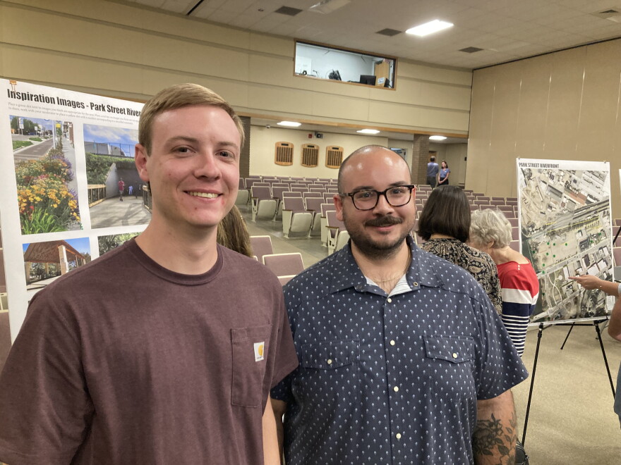 Austin Medford, left, and Jeff Denton attend an event on Canton's future development at Haywood Community College Tuesday, Aug. 18, 2026.